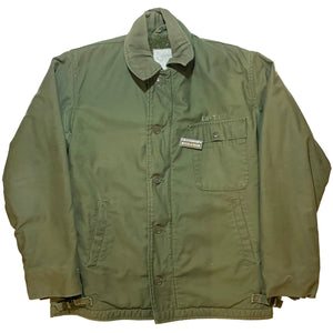 U.S. Navy Vietnam War Era OD Green NyCo A2 Permeable Cold Weather Deck Jacket with a Grandpops Army Navy logo.