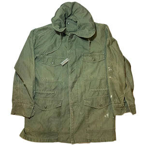 U.S. Army Vietnam War Era OG-107 Green Cotton Sateen M-1951 Field Jacket Dated 1962 with a Grandpops Army Navy logo.