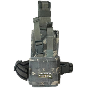U.S. Military ACU UCP Digital Camo Cordura Nylon Ambidextrous MOLLE Universal Pistol Holster with a Grandpops Army Navy logo.