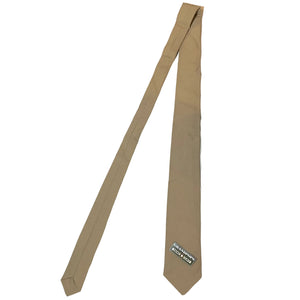 U.S. Marine Corps Cold War Khaki Polyester/Wool Tropical Necktie with a Grandpops Army Navy logo.