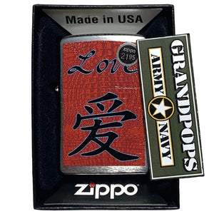 Zippo lighter with red design and 'Grandpops Army Navy' logo on packaging