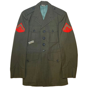 U.S. Marine Corps Service Alpha Green Shade 2241 Poly/Wool Man's Dress Jacket with a Grandpops Army Navy logo.